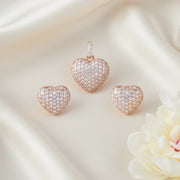 Rose gold heart crystal pendant and matching stud earrings jewellery set with sparkling pave stones
