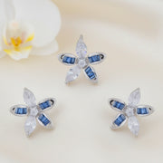 Blue crystal floral stud earrings with marquise stones and silver finish design
