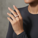 Rose gold eternity ring with cushion cut crystal stones in a full band luxury design for women
