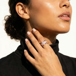 Rose gold crystal band ring with sparkling stones and bold geometric luxury design for women
