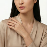 Rose gold geometric diamond band ring with sparkling crystal accents and polished luxury finish for women
