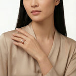 Rose gold Medusa statement ring with engraved round motif and open band luxury design for women
