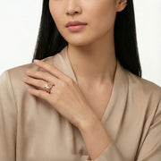 Rose gold Medusa statement ring with engraved round motif and open band luxury design for women
