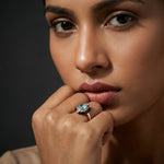 Luxury blue crystal halo ring with rose gold finish and black enamel detailing for women
