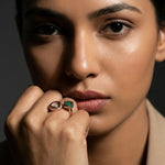 Rose gold open ring with crystal pavé detailing and green striped gemstone accent in modern geometric design for women
