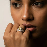 Luxury yellow crystal statement ring with baguette stone detailing and silver-tone finish for women
