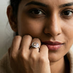 Luxury champagne crystal halo ring with baguette stones and silver finish for women’s statement jewellery styling.
