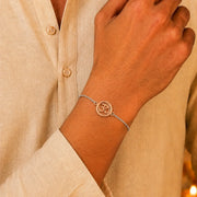 Om Silver Rakhi Bracelet