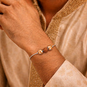 Divine Swastik Rakhdi Bracelet