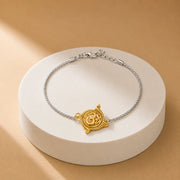 Om Rakhdi Silver Bracelet
