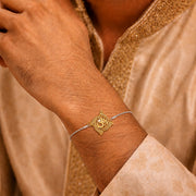 Om Rakhdi Silver Bracelet