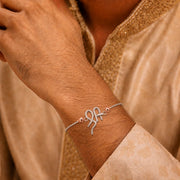 Elegant Om Rakhdi Bracelet