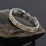 Modern dual tone link bracelet with silver frame and gold layered accents in a sleek contemporary design.
