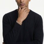 Minimal polished wave link bracelet with sleek modern silver-tone chain design for women’s everyday fashion jewelry.
