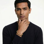 Elegant golden mesh link bracelet with textured geometric chain links and polished clasp design