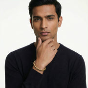 Elegant golden mesh link bracelet with textured geometric chain links and polished clasp design