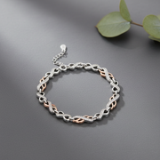 Two-Tone Infinity Sterling Silver Diamond-Cut Bracelet
