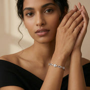 Dual-tone heart link bracelet with sparkling crystal circles and elegant adjustable chain design for women
