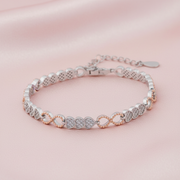 Intertwined Heart Infinity Bracelet - Two-Tone Silver Jewellery