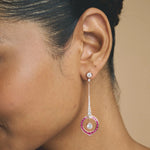 Rose gold pink halo drop earrings with sparkling white stones and circular gemstone design for women
