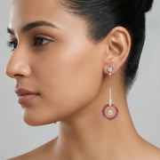 Rose gold pink halo drop earrings with sparkling white stones and circular gemstone design for women
