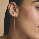 Rose gold tassel earrings with crystal stud detailing and long chain drop design for women
