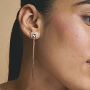 Rose gold tassel earrings with crystal stud detailing and long chain drop design for women
