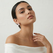 Rose gold pearl fan earrings with sparkling stones and geometric layered design for women’s party and casual wear.
