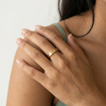 Luxury golden screw band ring with dual-tone silver finish and modern minimalist design for women.
