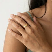 Luxury golden screw band ring with dual-tone silver finish and modern minimalist design for women.
