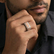 Modern rose gold bar crystal statement ring with sparkling stone accents and polished silver finish for men

