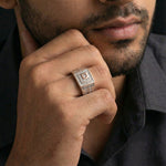 Rose gold square halo crystal ring with geometric design and sparkling stone detailing for men.
