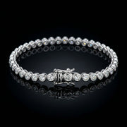 Luxury diamond line bracelet with sparkling round crystals and sleek silver-tone design for elegant women’s jewellery fashion.
