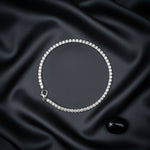 Elegant diamond spark tennis bracelet with shimmering crystal stones and polished luxury finish for women.
