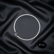 Elegant diamond spark tennis bracelet with shimmering crystal stones and polished luxury finish for women.
