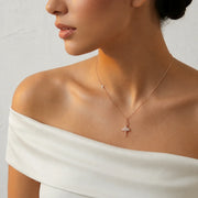 Rose gold ballerina pendant necklace with sparkling crystal accents and delicate chain
