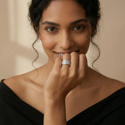 Elegant baguette crystal open ring with shimmering silver finish and modern adjustable band design for women.
