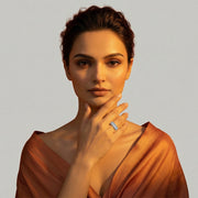 Elegant princess cut crystal ring with sparkling rectangular stones and polished silver-tone finish for women.
