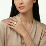 Modern rose gold open ring with glossy white pearl-inspired stone and minimalist adjustable design for women.
